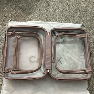 CALPAK Large Clear Cosmetics Case in Mauve.